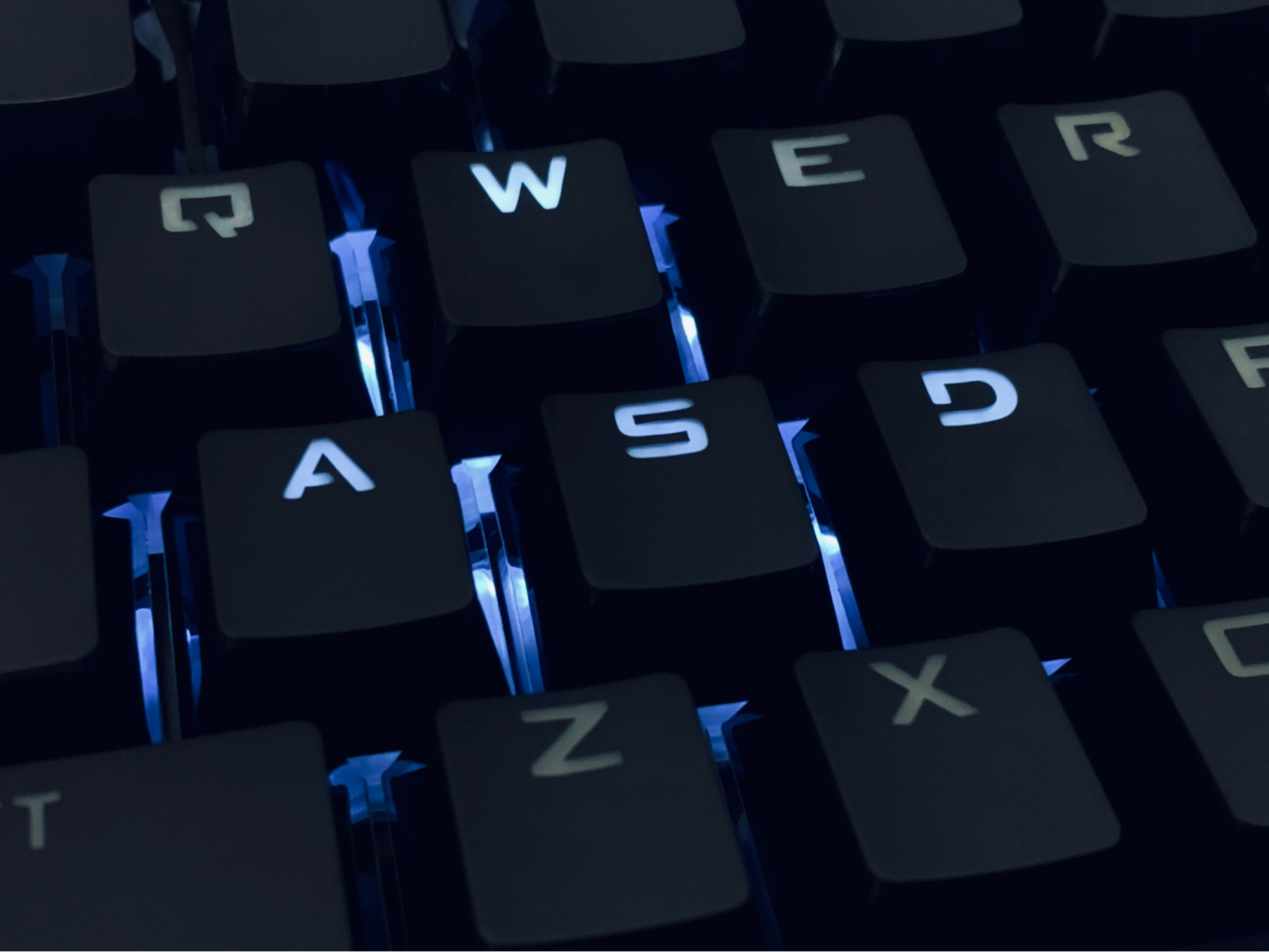 QWERTY keyboard in a blue backlight